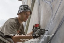 Атлант украсил дом в переулке Гаршина в Нижнем Новгороде, в рамках фестиваля Новый город: Древний