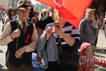 Шествие первомайской колонны по улице Большая Покровская в Нижнем Новгороде