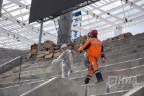 Маляры на стройплощадке Стадиона Нижний Новгород