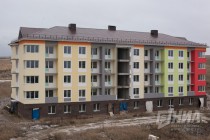 Согласно дизайн-проекту дома должны были быть разноцветными