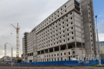 Деньги облбюджета не потребовались для закрытия фасада недостроенной гостиницы у Стадиона Нижний Новгород